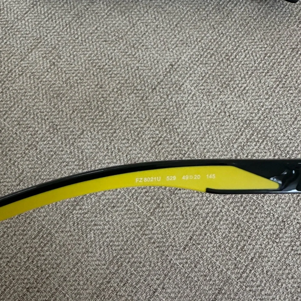 Ferrari Clear Frame Glasses with Yellow and Black Accents